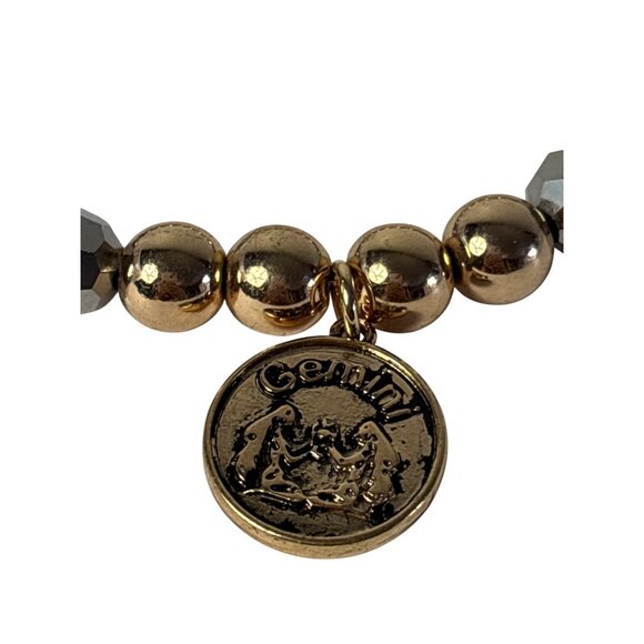 Gemini Bold Charm Stretchy Bracelet With Goldtone and Grey Beads - Picture 2 of 5